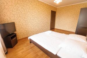 Ένα ή περισσότερα κρεβάτια σε δωμάτιο στο 2кв Широтная 157