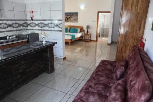 Kuchyň nebo kuchyňský kout v ubytování Grann Kaz Guest House