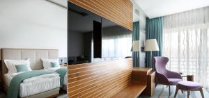 Postel nebo postele na pokoji v ubytování Hotel Navis