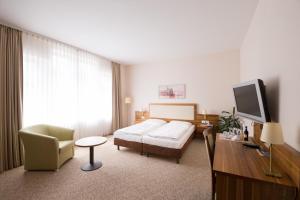 Ein Bett oder Betten in einem Zimmer der Unterkunft Boardinghouse am Wall