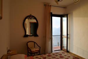 A bed or beds in a room at Il Belvedere