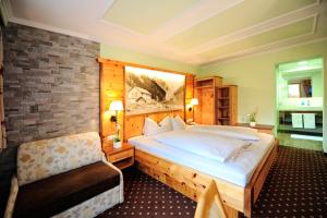 Postel nebo postele na pokoji v ubytování Alpenhof Pitztal