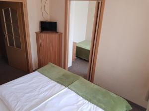 Łóżko lub łóżka w pokoju w obiekcie Villa Nina