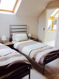 Cama ou camas em um quarto em Holland House