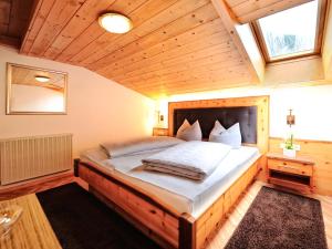 Postel nebo postele na pokoji v ubytování Alpenhof Pitztal