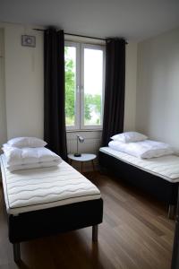 Letto o letti in una camera di Alkoven Logi