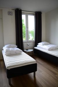 Letto o letti in una camera di Alkoven Logi