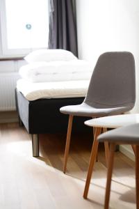 Letto o letti in una camera di Alkoven Logi
