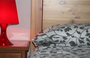 A bed or beds in a room at B&B Villa Dalegno
