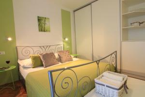 Кровать или кровати в номере Apartments Lavanda