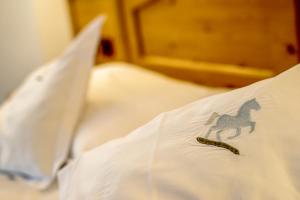 Fotografie z fotogalerie ubytování Hotel Alpino Al Cavalletto v destinaci Canazei