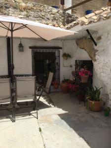 Patio alebo iná vonkajšia časť ubytovania Casa Rural Cueva El Sauce