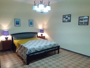 Llit o llits en una habitació de Casa Skanderbek