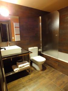 Kylpyhuone majoituspaikassa Hotel Areulo
