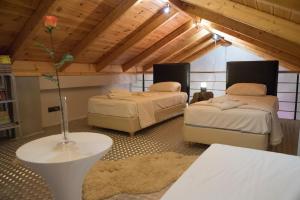 Postel nebo postele na pokoji v ubytování Odysseos St. Loft