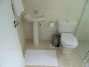 Koupelna v ubytování Hotel Anjos LTDA