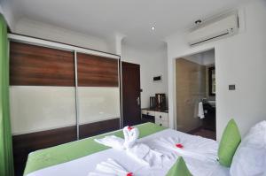 Voodi või voodid majutusasutuse Yasad Residence toas