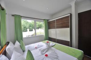 Voodi või voodid majutusasutuse Yasad Residence toas