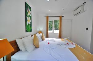 Voodi või voodid majutusasutuse Yasad Residence toas