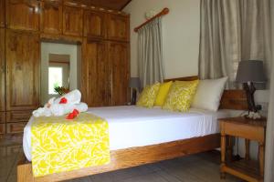 Postel nebo postele na pokoji v ubytování Grann Kaz Guest House