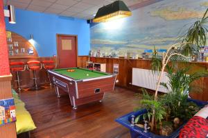 a billiard room with a pool table in it at Oban Backpackers in Oban