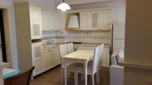 Η κουζίνα ή μικρή κουζίνα στο Laura's Home +33 φωτογραφίες