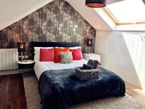 Cama ou camas em um quarto em Loft Living Oxford