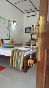 Rúm í herbergi á Winmi Resort