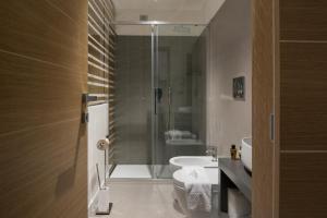 Kopalnica v nastanitvi Caportigia Boutique Hotel