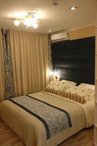 Postel nebo postele na pokoji v ubytování Hotel Sicilia