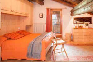 Llit o llits en una habitació de Albergo Diffuso Sauris in Sauris Di Sopra