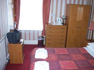 Cama o camas de una habitación en Ashurst Lodge