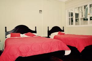 Postel nebo postele na pokoji v ubytování Hotel Europa