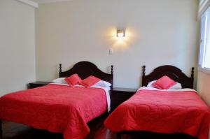Postel nebo postele na pokoji v ubytování Hotel Europa
