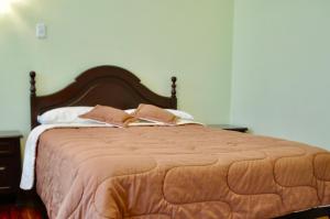 Postel nebo postele na pokoji v ubytování Hotel Europa