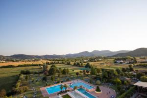 an aerial view of a park with a swimming pool at Hotel Terme Leonardo in Abano Terme