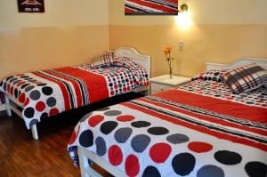 Postel nebo postele na pokoji v ubytování Hotel Europa