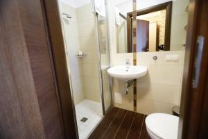 Kúpeľňa v ubytovaní Hotel Fajkier