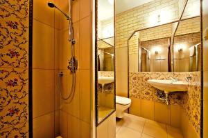 Kúpeľňa v ubytovaní Hotel Fajkier