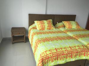 Tempat tidur dalam kamar di Costa Azul Suite 606