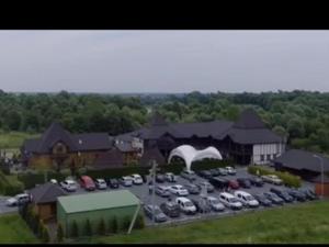 arial view of a parking lot with cars parked at Hotel Vulyk in Duliby