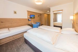 Postelja oz. postelje v sobi nastanitve Hotel Garni Entstrasser