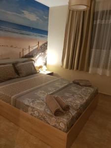 Posteľ alebo postele v izbe v ubytovaní Apart Hotel Iglika