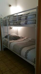 a bedroom with two bunk beds in a room at Studio Le Marquis 2 in Morzine