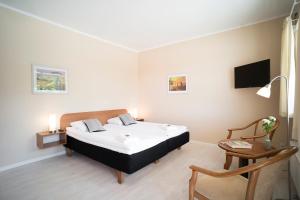 Postel nebo postele na pokoji v ubytování Hotel Sleep2Night