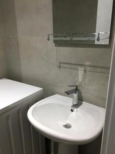 Ένα μπάνιο στο Apartment Bakuriani