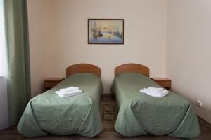 
Кровать или кровати в номере Отель Каунис
