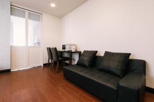 Posezení v ubytování Guest House Yasuragi Hakataekimae