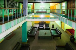 Uma área de estar em Hotel Nana