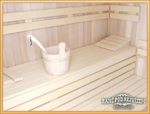 a inside of a sauna with a bucket on it at Ranc pod Rejvizem in Zlaté Hory